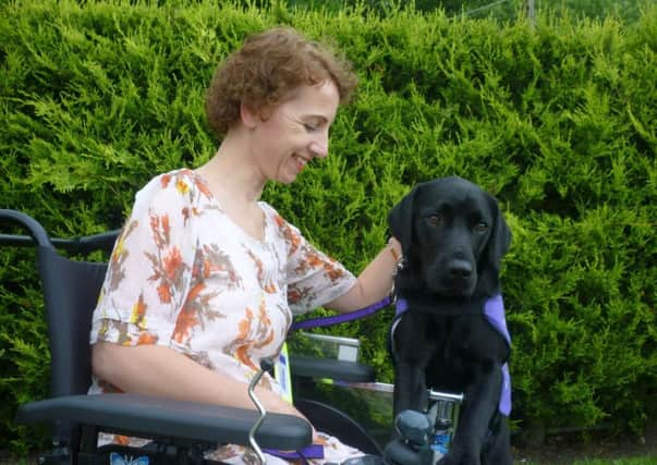 Kerenza Holzman, from Bognor Regis, with her canine partner Whisky