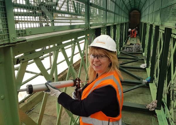 Lewes MP Maria Caulfield helping to add some finishing touches