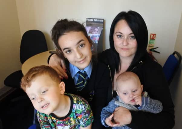 Kerry Cattermole with Faye, 13, Luca, three, and Royce, six months