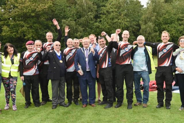 Pictured is the Mayor of Haywards Heath, Jim Knight, with The Royle Air Force Wings Parachute Display Team, town councillors and dignitaries.