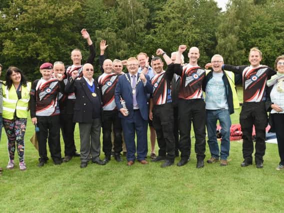Pictured is the Mayor of Haywards Heath, Jim Knight, with The Royle Air Force Wings Parachute Display Team, town councillors and dignitaries.