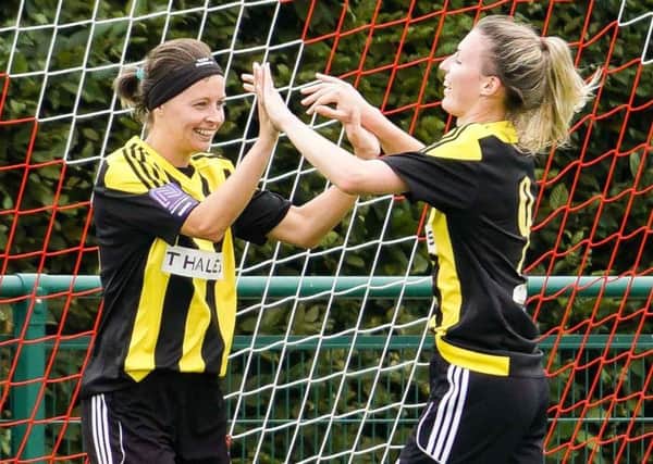 Two-goal Faye Rabson (left) and Sian Heather celebrate against Ipswich (Picture: Ben Davidson - www.bendavidsonphotography.com) SUS-180820-200554002