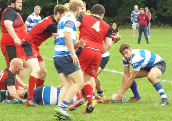 Connor Shaw sets up another backs' move during Hastings & Bexhill Rugby Club's 26-26 draw away to Park House. Picture courtesy Peter Knight