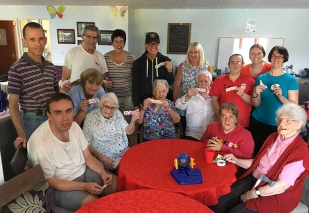 Adults who visit Burgess Hill day centre service Burnside have been making a weekly visit to nearby elderly care home Edward House as part of their activities schedule SUS-180917-095122001