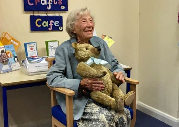 Jen Jennings from Pulborough with her 96-year-old teddy bear which has been restored for 100th birthday SUS-181209-155411001