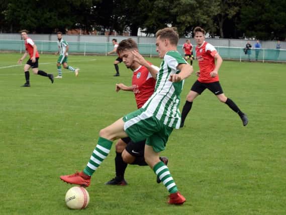 Kieran Hartley looks for control as Chi City get the better of Peacehaven / Picture by Kate Shemilt