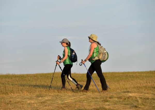 Macmillan Cancer Research Walkers on their way to Eastbourne (Photo by Jon Rigby) SUS-180907-105117008