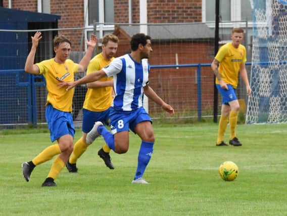 Action from Lancing's FA Cup win at Haywards Heath. Picture by Grahame Lehkyj