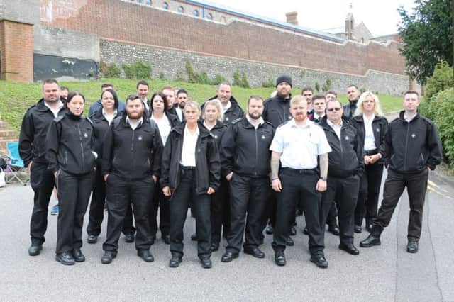Staff gathered outside Lewes Prison