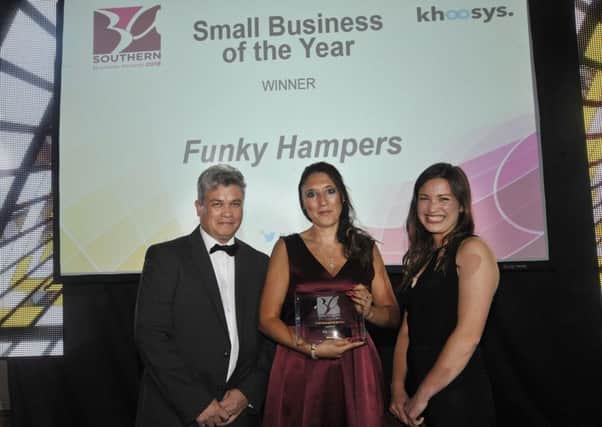 Small Business of the Year Winner Funky Hampers, Eastbourne (centre) & sponsor's Stephen & Katherine Khoo from Khoo Systems. SUS-180909-144640001