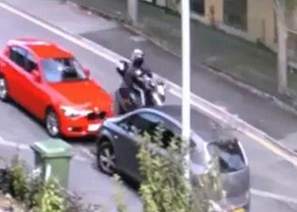 Police released CCTV of the collision involving a moped and a child on a scooter in Brighton