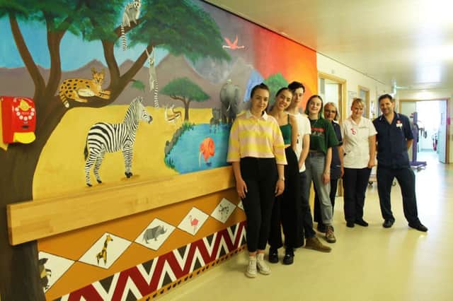 Students Lydia, Felix, Jamie and Jasmine with staff at the Royal Alexandra Children's Hospital