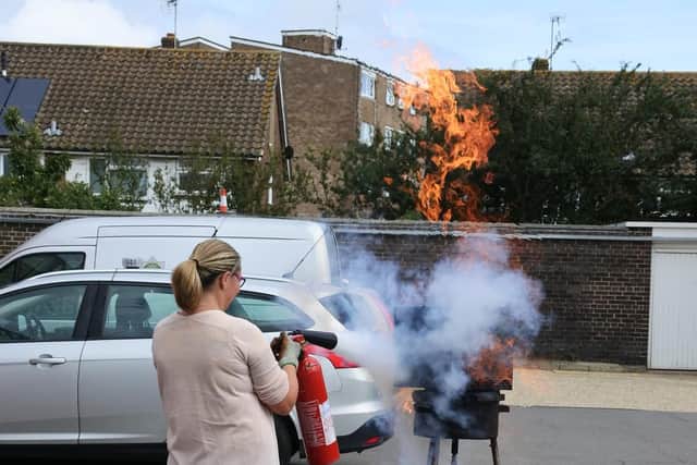 Having a go at using the CO2 extinguisher