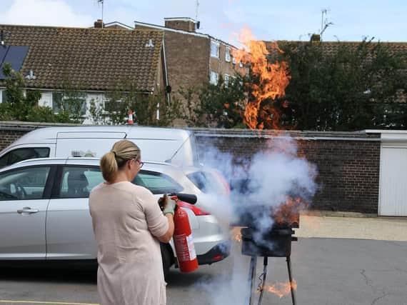 Having a go at using the CO2 extinguisher