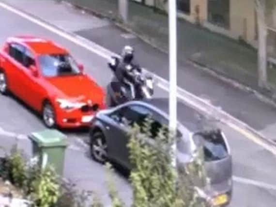 Police released CCTV of the collision involving a moped and a child on a scooter in Brighton
