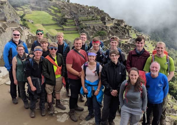 Dans team at the top of Machu Picchu