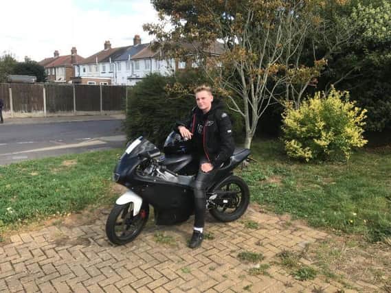 Max Vaughan Baker, 16, with his Aprilia RS50 motorbike