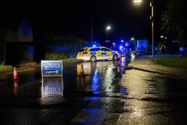 Police closed off the road. Picture by Eddle Howland SUS-180922-105613001