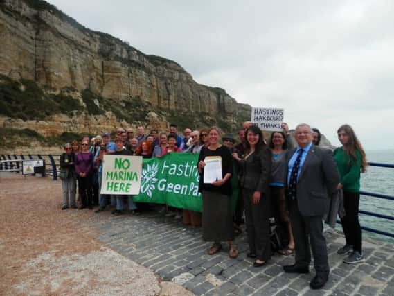 Members of Hastings Green Party and friends hand in the petition opposing the marina complex at Rock-a-Nore earlier this year. SUS-180922-111812001