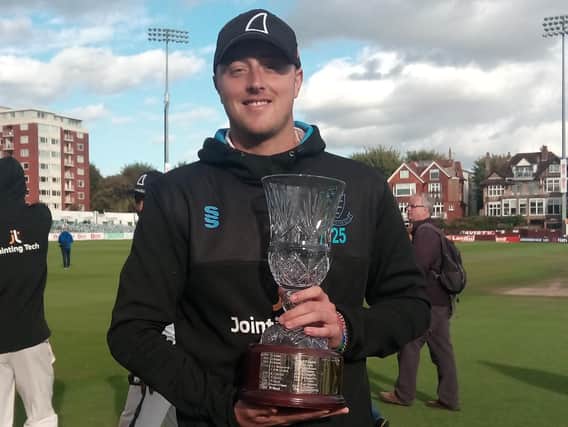 Ollie Robinson with the trophy after being named Sussex's county championship man of the season
