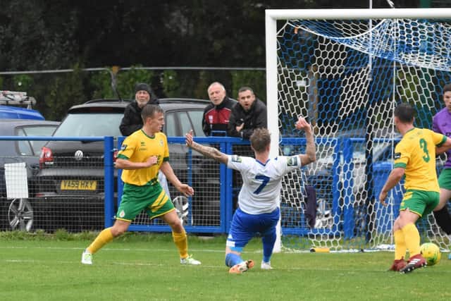 Callum Saunders pokes the ball home to open the scoring. Picture by Grahame Lehkyj