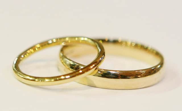 File photo dated 23/04/07 of two wedding rings as deals about what should happen to property owned before a marriage in the event of a divorce could be made legally-binding under options being considered by the Law Commission. PRESS ASSOCIATION Photo. Issue date: Tuesday January 11, 2011. But any future law could make a distinction between any property or wealth acquired by each person before a marriage and that gained as a couple, the body which reviews and reforms law in England and Wales said. See PA story LEGAL PreNuptial. Photo credit should read: Niall Carson/PA Wire ENGEMN00120111101104229