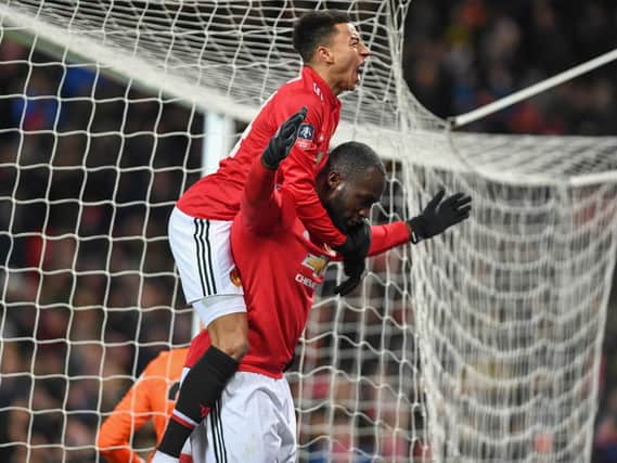 Manchester United's Romelu Lukaku and Jesse Lingard celebrate a goal against Brighton last season. Picture by PW Sporting Photography