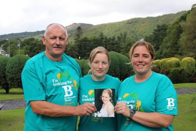 Richard Pattinson, Amanda Digweed and Tayna Clubb holding a photo of her sister Sammie