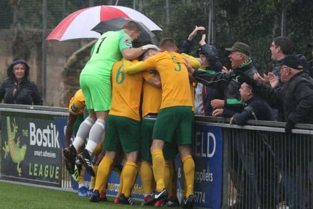Horsham players - including goalkeeper Josh Pelling celebrate Chris Smith's goal against Heybridge Swifts on Saturday. Picture by John Lines