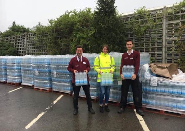 Water bottles being handed out at South Downs Nurseries in Hassocks. Photo contributed