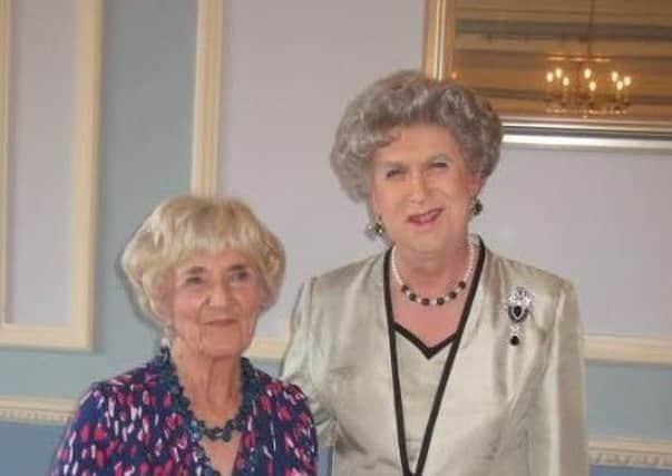 Willingdon flower club chariman (left) with Lady Crabtree SUS-180926-112238001