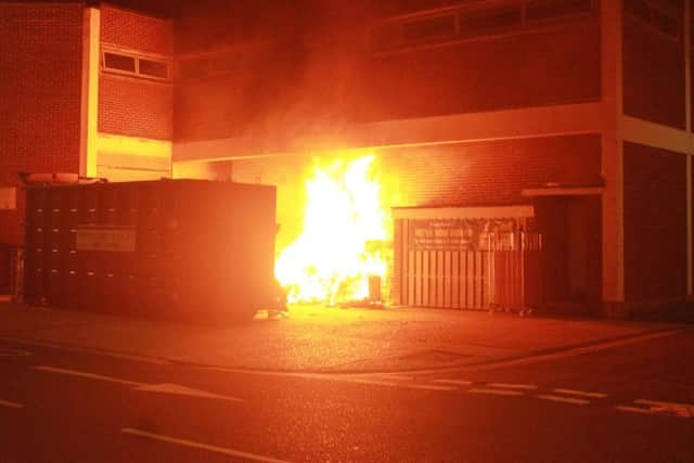 The fire at the rear of the building. Photo: Ethan Costello