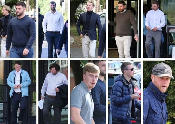Ten people charged with violent disorder at Goodwood Racecourse appeared in court yesterday