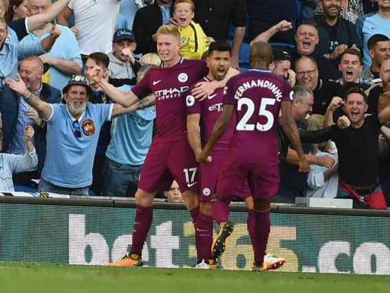 Sergio Aguero celebrates scoring against Brighton at the Amex last season. Picture by PW Sporting Photography