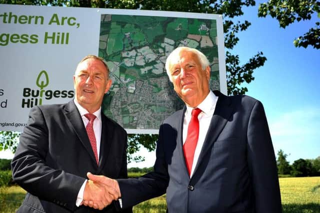 Garry Wall, leader of Mid Sussex District Council, with Sir Edward Lister, chairman of Homes England at the Northern Arc site in July. Picture: Steve Robards