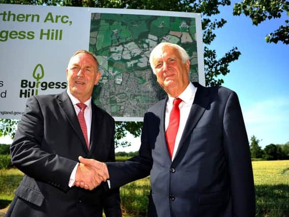 Garry Wall, leader of Mid Sussex District Council, with Sir Edward Lister, chairman of Homes England at the Northern Arc site in July. Picture: Steve Robards