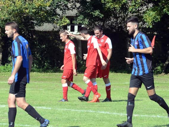Bosham celebrate a goal in a recent clash with Worthing Town / Picture by Kate Shemilt