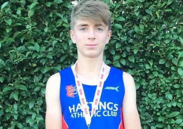 George Pool with his medal for running the fastest lap by an under-17 athlete at the South East Road Relays. Picture courtesy Terry Skelton
