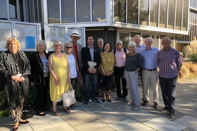 Members of the new Hove Beach Huts Association outside the town hall