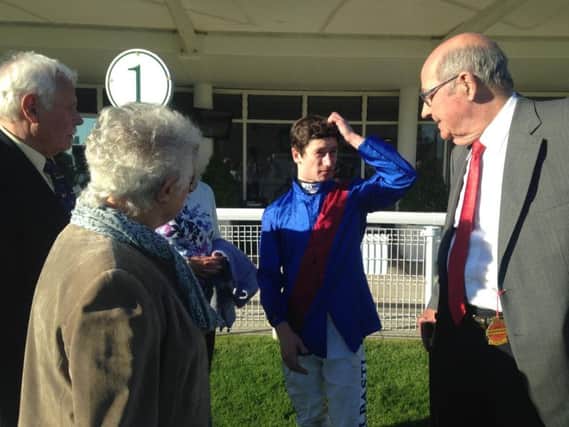 Jockey Oisin Murphy chats to connections after a Goodwood win - can he add to his tally at the season finale on October 14?
