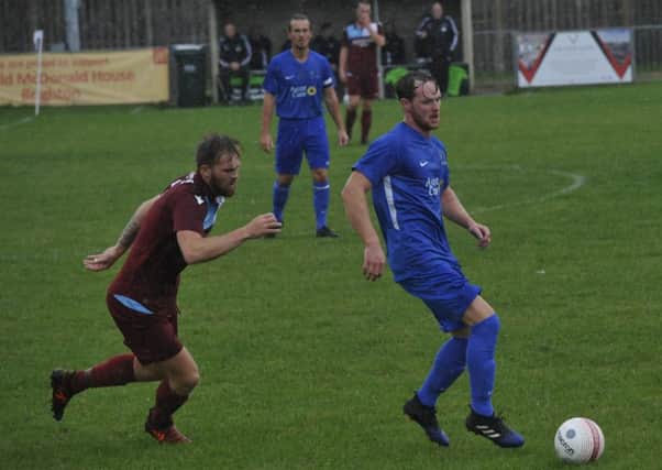 Little Common full-back Ryan Paul closes down an opponent during last weekend's 3-0 defeat at home to Broadbridge Heath. Picture by Simon Newstead