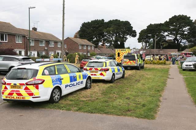 Emergency services respond to a house fire in Rustington SUS-180930-164811001