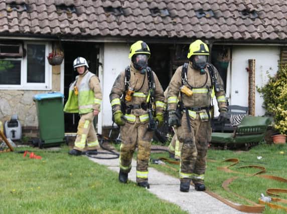 Emergency services respond to a house fire in Rustington SUS-180930-164823001