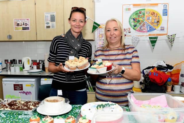 MacMillan Coffee Morning.

A coffee morning is being held to raise money for the  Macmillan charity, in memory of Dr Ben Ross, who lost his life to cancer at the age of 89.

Pictured are L-R Hayley Wood and Jo Orton.

Bolnore Village School, Middle Village, Haywards Heath, Mid Sussex. 

Picture: Liz Pearce 29/09/2018

LP181565 SUS-180930-140921008