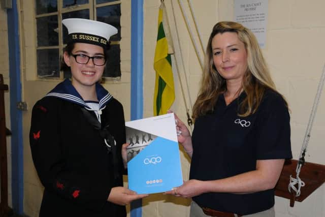 Ordinary cadet Ellie Gordon was presented with her BTEC Level 1 certificate by Debbie Barry, regional manager of education charity CVQO
