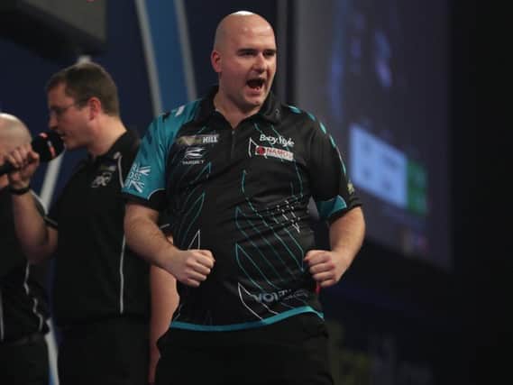 Rob Cross at the oche during his victory over Phil Taylor in the 2018 William Hill World Darts Championship final. Picture courtesy Lawrence Lustig/PDC