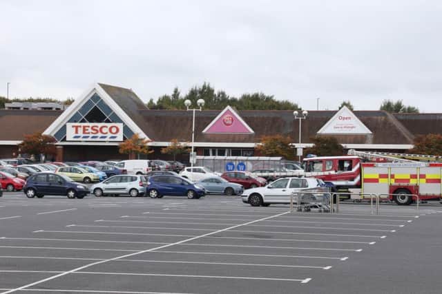 The attack happened in the car park of Tesco Littlehampton, police say