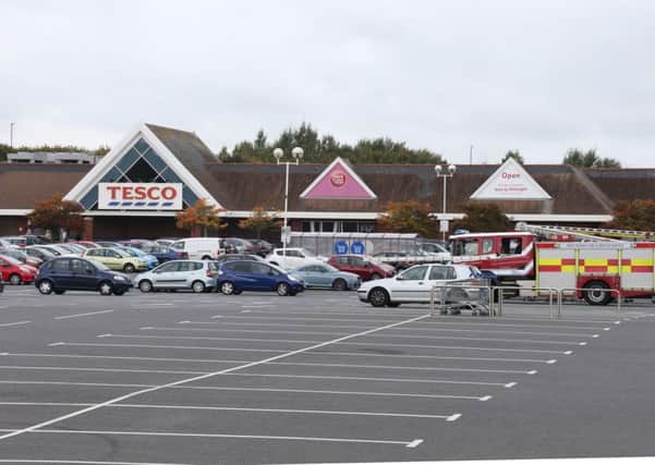 The attack happened in the car park of Tesco Littlehampton, police say