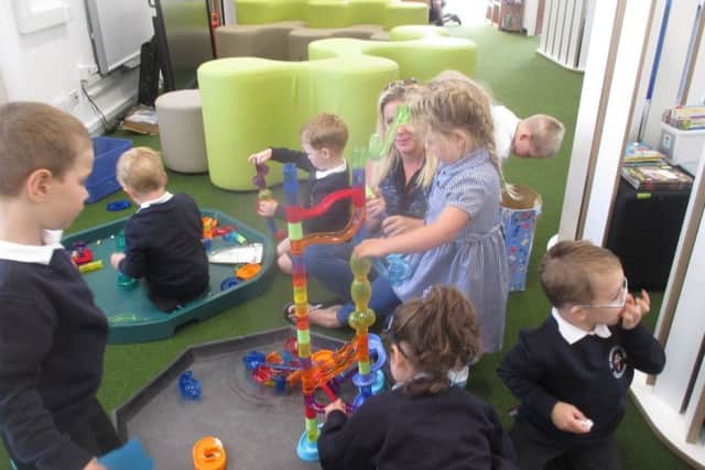 Early years children at St Marys CofE (Aided) Primary School in Pulborough enjoying their newly transformed classrooms