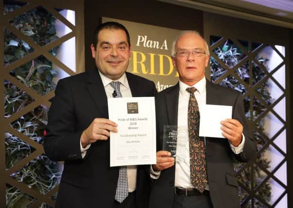 Shoreham customer assitant Mike Whittaker, right, receives the Pride of M&S Award for fundraising. Picture: CPG Photography
